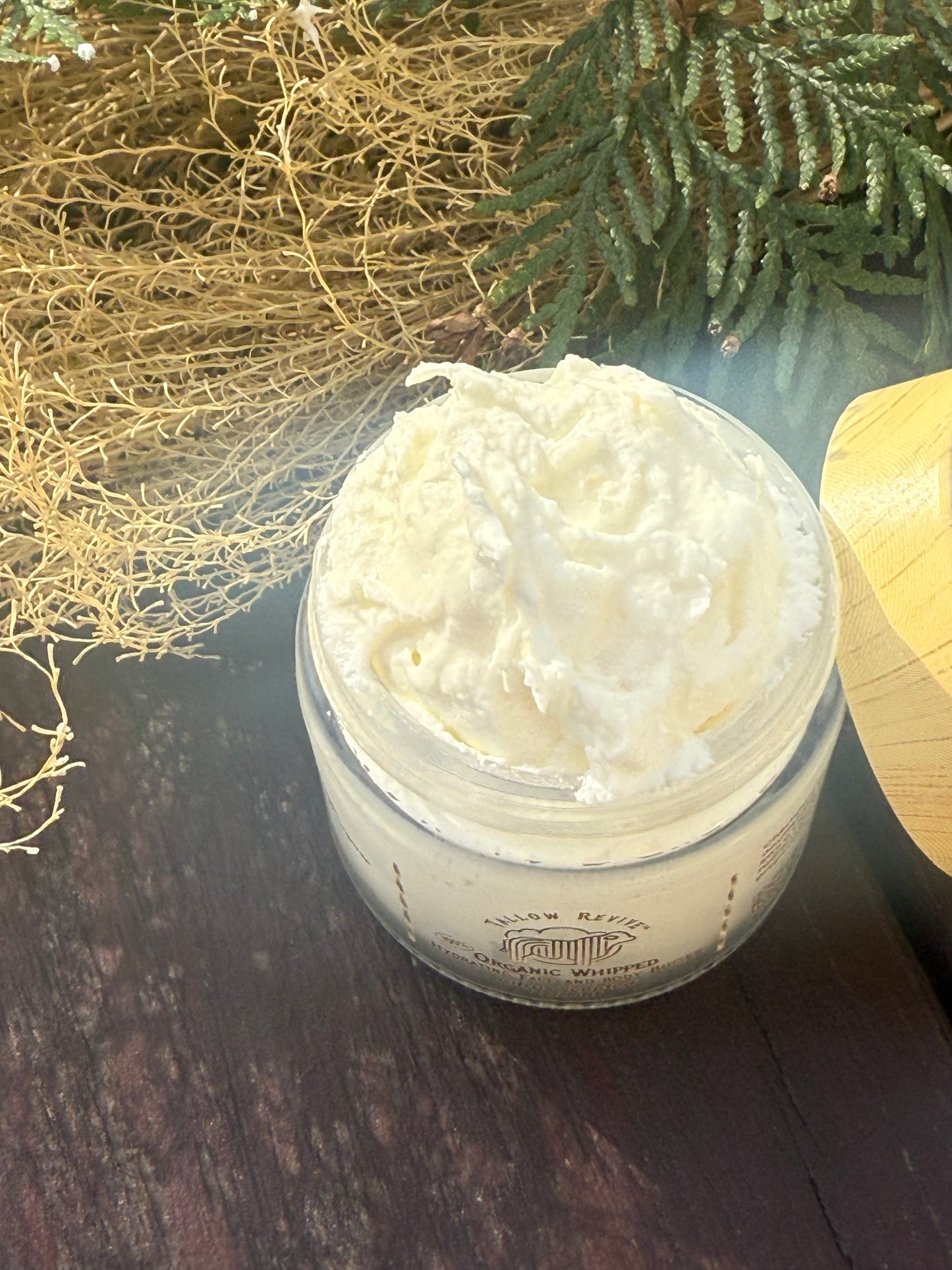Unscented Cloud-Like Whipped Grass Fed & finished Face an Body Butter - in open glass jar.